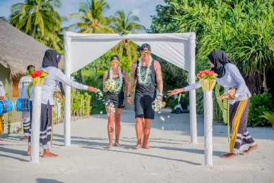 Family celebrating at a Maldives wedding