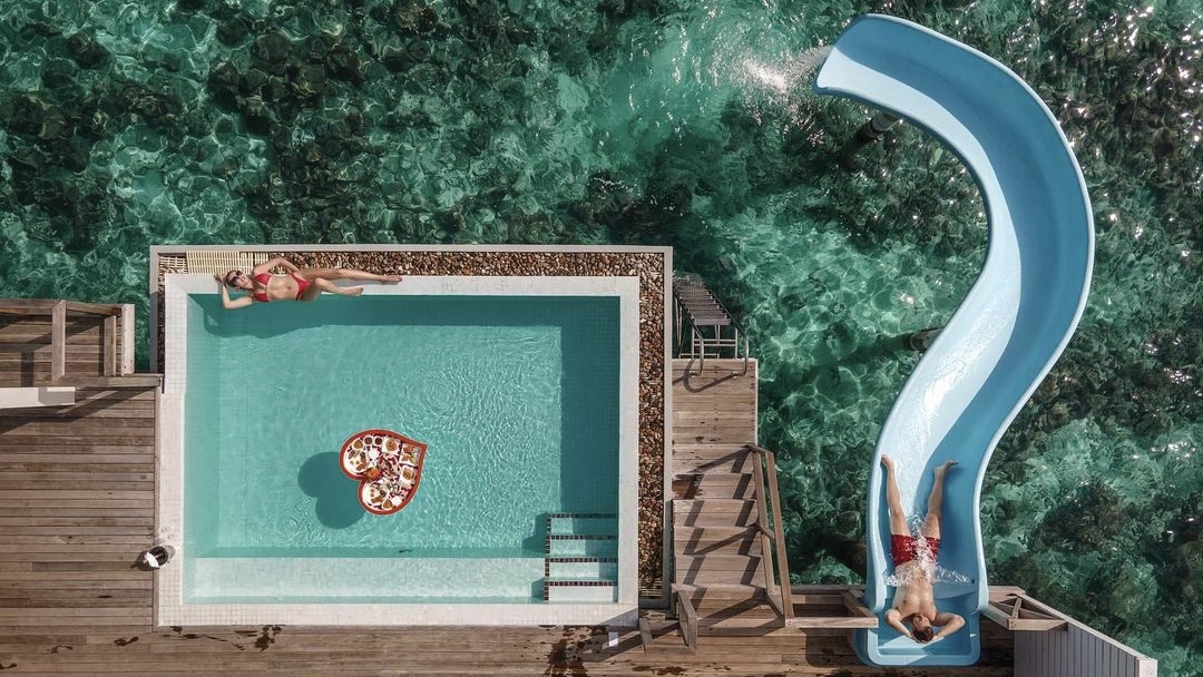 Pool with slide at Siyam World